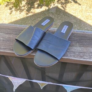 Stylish Black Leather Steve Madden Slides shoe
